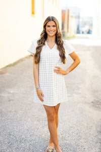 Dolce Cabo: Faux Leather Embroidered Dress in Creme