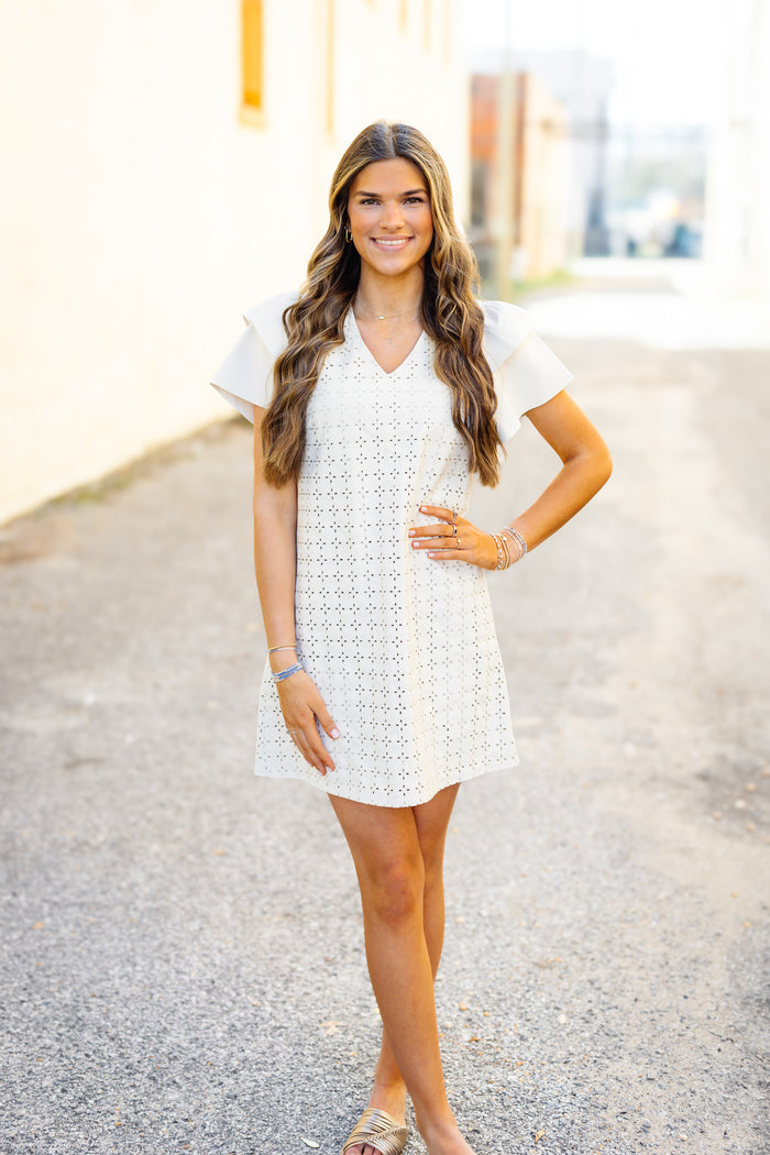 Dolce Cabo: Faux Leather Embroidered Dress in Creme