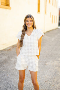 Dolce Cabo: Vegan Leather Eyelet Shorts